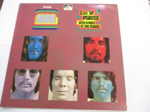 2ozs of plastic with a hole in the middle (RE)