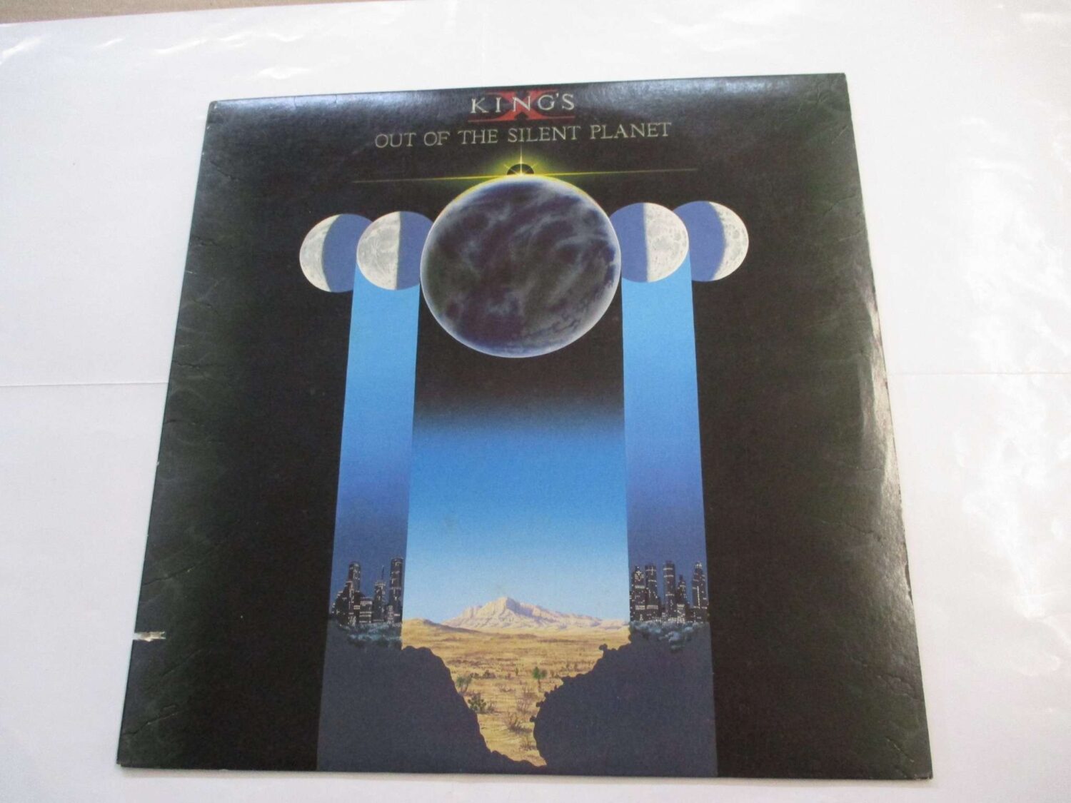 Out of the silent planet (CUT OUT SLEEVE)