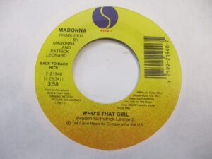 Who's that girl / Causing a commotion (RE)