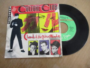 Church of the poison mind / Man shake