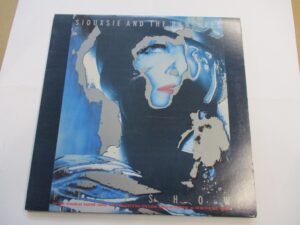 Peepshow (cut out sleeve)