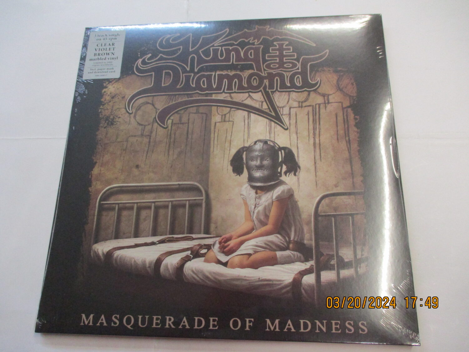 Masquerade Of Madness (NR) (CLEAR VIOLET BROWN MARBLED VINYL)