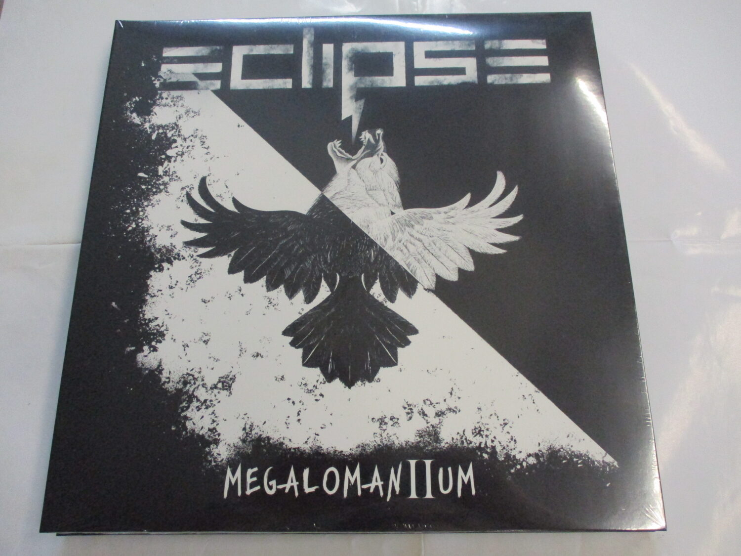 MEGALOMANIUM II (CRYSTAL BLACK SPLATTER VINYL)