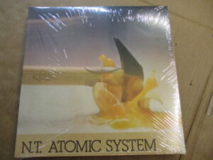 N. T. New Atomic System (RE)